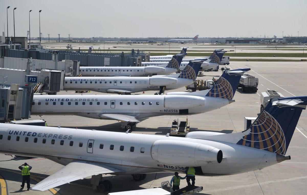 Shocking moment plane engine catches fire before takeoff at Chicago airport