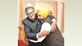 CM Mann hugs new Punjab governor as his wife touches his feet