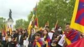 Demonstrators gather in Paris against Chinese Xi Jinping's visit