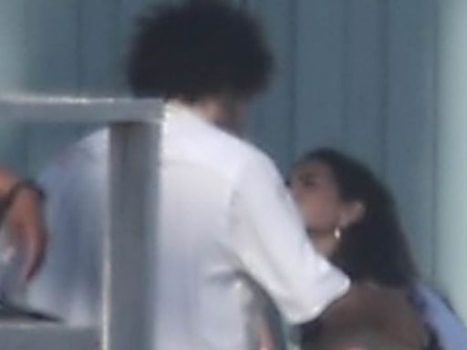 Selena Gomez and Benny Blanco cling to each other at July 4th party