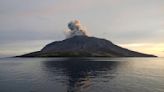 Airport near volcano reopens as Indonesia lowers eruption alert level