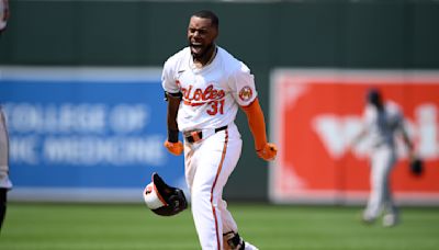 Orioles stay in first place thanks to Yankees' miscues, beat New York 6-5 on Mullins' double in 9th