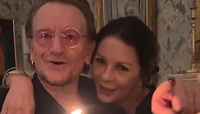 Bono sings "happy birthday" with Catherine Zeta-Jones in joint birthday celebration with husband, Michael Douglas, in Dublin