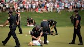 Watch: Environmental protesters target PGA Tour as Scottie Scheffler lines up putt