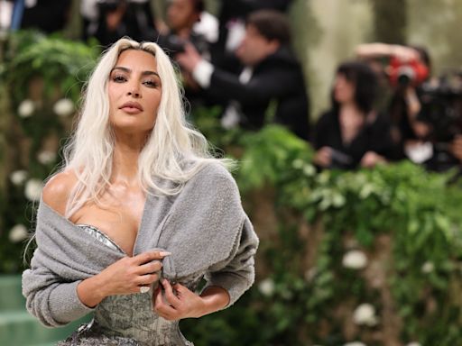 Trolls question Kim Kardashian’s ‘raggedy’ Met Gala sweater cover-up