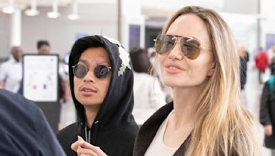 Angelina Jolie bonds with son Pax as they fly out after TIFF premiere