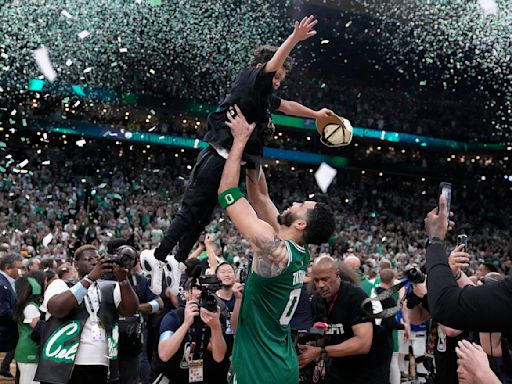 Celtics star Jayson Tatum overcome with emotion as he celebrates NBA championship with his son