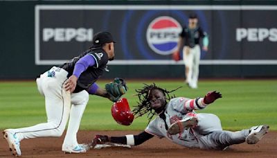 Kevin Newman's two-run single in the 9th gives the Diamondbacks a 6-5 victory over the Reds