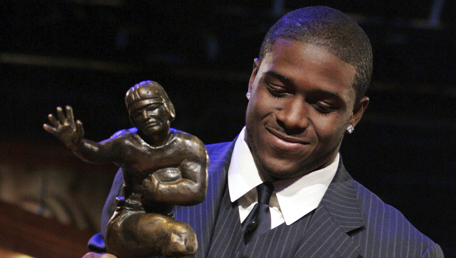 How Reggie Bush Wound Up With A Returned Heisman Trophy and $25 Million In Net Worth