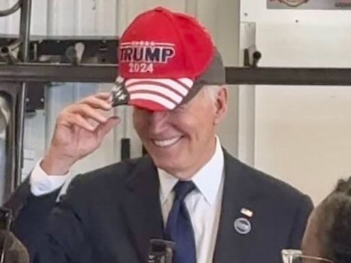 Joe Biden wears Trump MAGA hat as he's called 'old fart' by supporter