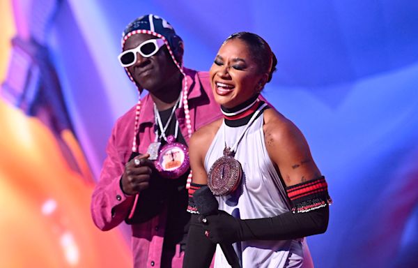 Flavor Flav Presents Jordan Chiles With Promised Custom Bronze Clock At 2024 MTV VMAs