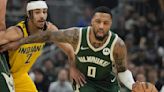 Damian Lillard's 35-point 1st half helps Bucks beat Pacers 109-94 without Giannis in playoff opener