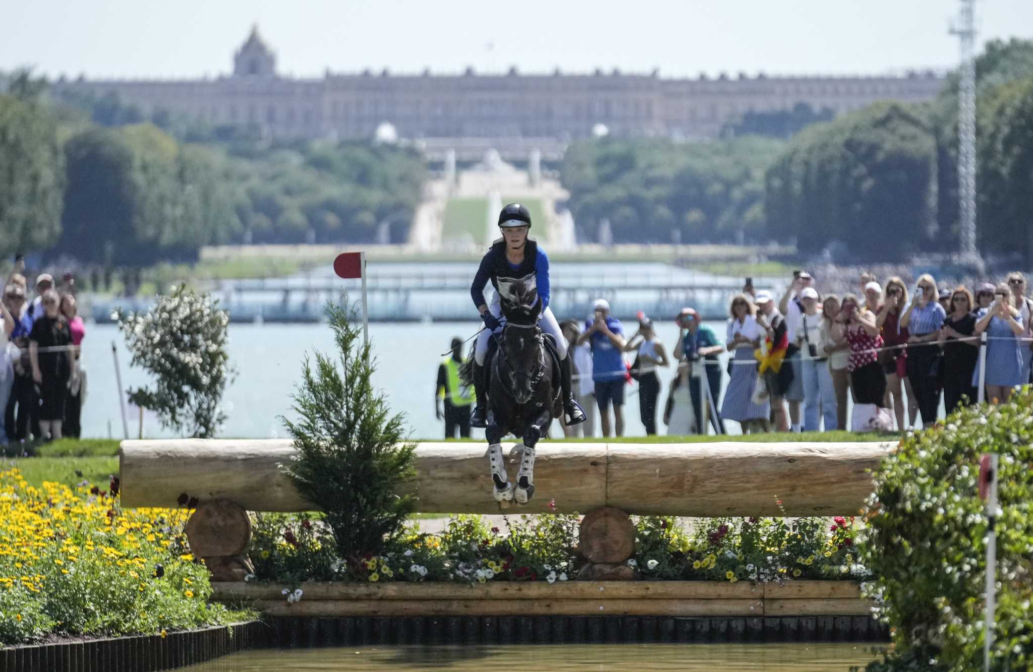 Olympic riders get a memorable gallop in the sumptuous-looking Versailles Palace gardens