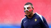 France hopeful masked Mbappé will play as he trains to face Netherlands in Euro 2024