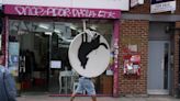 Banksy’s howling wolf artwork removed less than an hour after unveiling