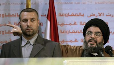 An Israeli strike in Syria kills a former bodyguard of Lebanon's Hezbollah leader, official says