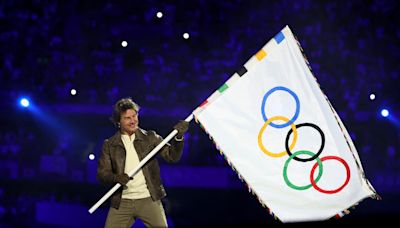 Tom Cruise’s Dive into the Paris Olympics Closing Ceremony Follows a Long History of Daring Stunts