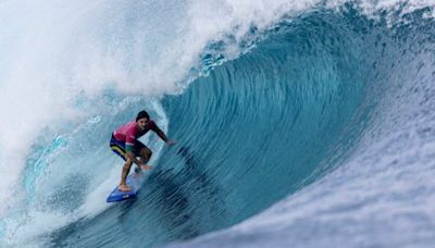 Gravity-Defying Photo of Olympic Surfer With Near-Perfect Score Goes Viral