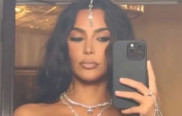 Kim Kardashian Broke Wedding Guest Etiquette With Her Red Tassel Bra