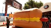 It's a ketchup-and-mustard-colored party at Tail o' the Pup's grand reopening