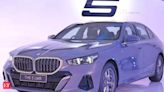 BMW launches 5 Series luxury sedan, two new Mini Coopers, and its first scooter for Indian markets. Check features and prices