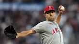 Angels build early cushion, hang on to beat Giants
