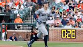 Judge sets club HR mark as Yankees catch O's atop AL East