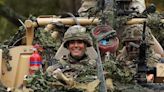 Kate Middleton dons military fatigues and drives seven-tonne armoured truck during regiment visit