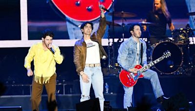 The Jonas Brothers tour brought the hits and a song for a newly engaged couple to Phoenix