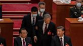 Former Chinese president Hu Jintao unexpectedly led out of party congress