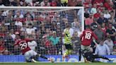 Arsenal beats Man United 1-0 to take title race with Man City to final day of Premier League season