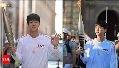 BTS' Jin receives thundering cheers as he carries Paris Olympics torch: I'm very honored | K-pop Movie News - Times of India