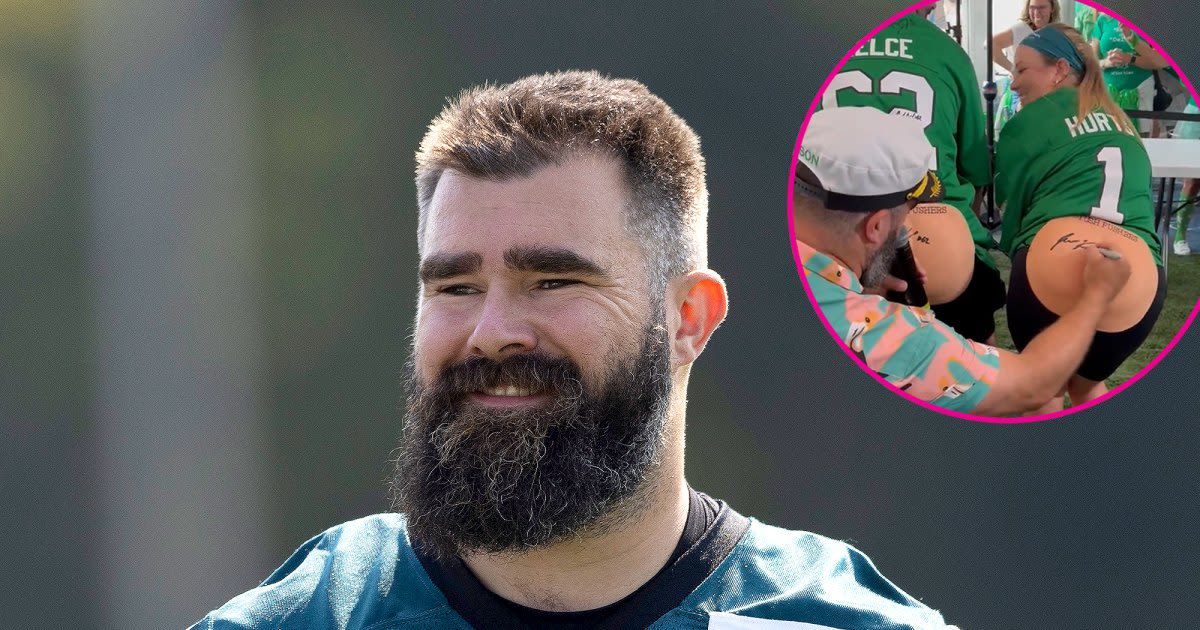 Jason Kelce Signs A Pair of Fake Butts at Eagles Charity Bowl