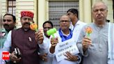 Special status denial: Opposition teases JD(U) govt with jhunjhuna, toys in Bihar assembly | Patna News - Times of India