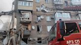 Russia strikes Ukraine housing; detains refugees at border