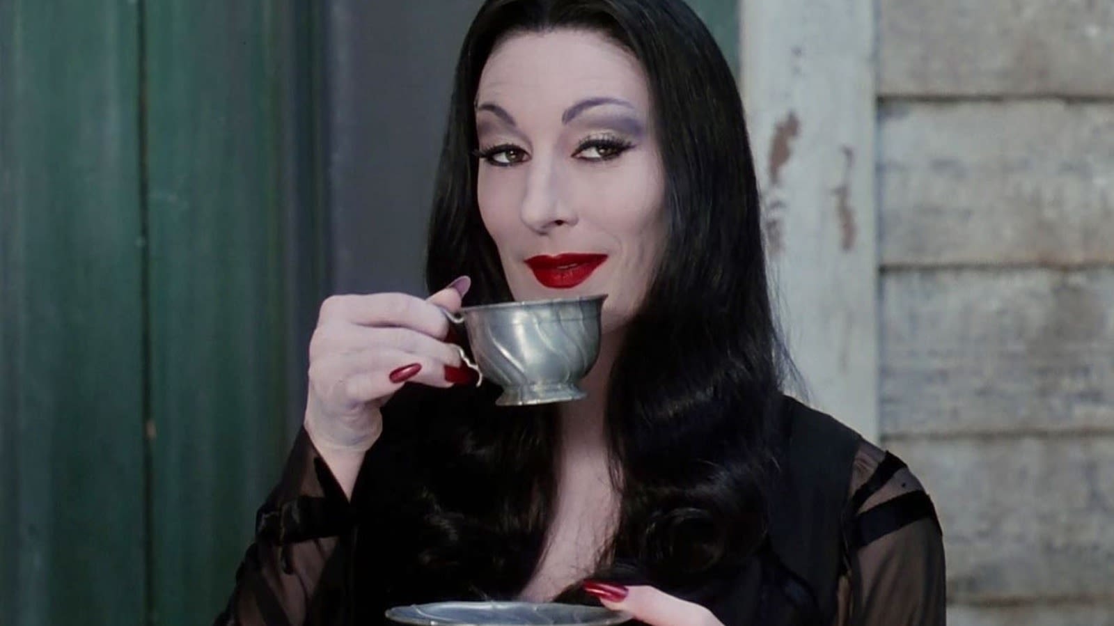 The Addams Family Put Anjelica Huston Through Intense And Restrictive Conditions - SlashFilm