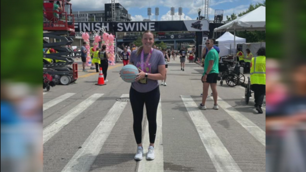 Area basketball coach completes Flying Pig Marathon while dribbling basketball