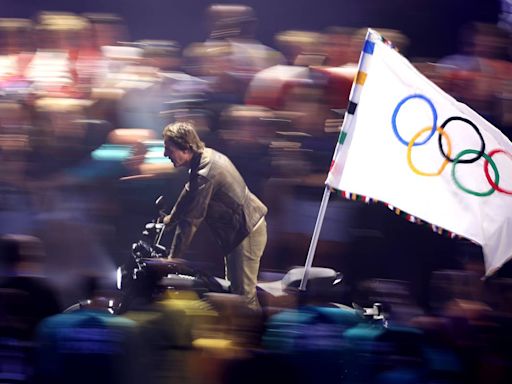 Tom Cruise's Olympics closing ceremony stunt took over 1 year to plan. Here's how it came together.