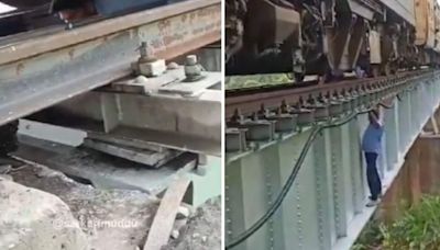 Indian Railways staff walk on edge of bridge, crawl under train to fix air leakage. Watch shocking video