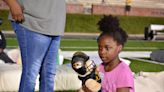 100 Columbia-area children receive beds during 'Hope to Dream' event at Faurot Field