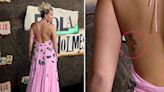 Millie Bobby Brown’s plunging gown reveals rarely seen tattoos on red carpet with boyfriend Jake Bongiovi