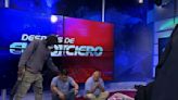 Ecuador's escalating gang violence is broadcast live to the nation as masked gunmen storm TV studio