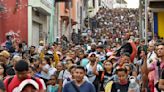 Mexican and Guatemalan presidents meet at border to discuss migration, security and development