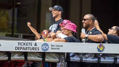 WATCH: Mazzulla jumps off duck boat, high-fives fans at C's parade