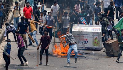 U.S. travel advisory level to Bangladesh raised after police impose "shoot-on-sight" curfew amid protests