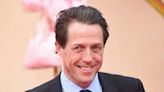 Hugh Grant Jokes About His Free Time: 'I'm Swamped in Children and Too Old for Them' (Exclusive)