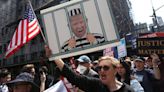 Trump Fans and Foes Compete for Last Word as Former President Surrenders at Manhattan Courthouse