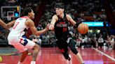 Tyler Herro scores 24 points, Heat top Wizards 121-114 in tournament opener