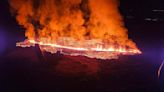 Buildings burn as lava from Icelandic volcano eruption flows into evacuated fishing town