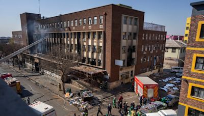 An inquiry into a building fire in South Africa that killed 76 finds city authorities responsible